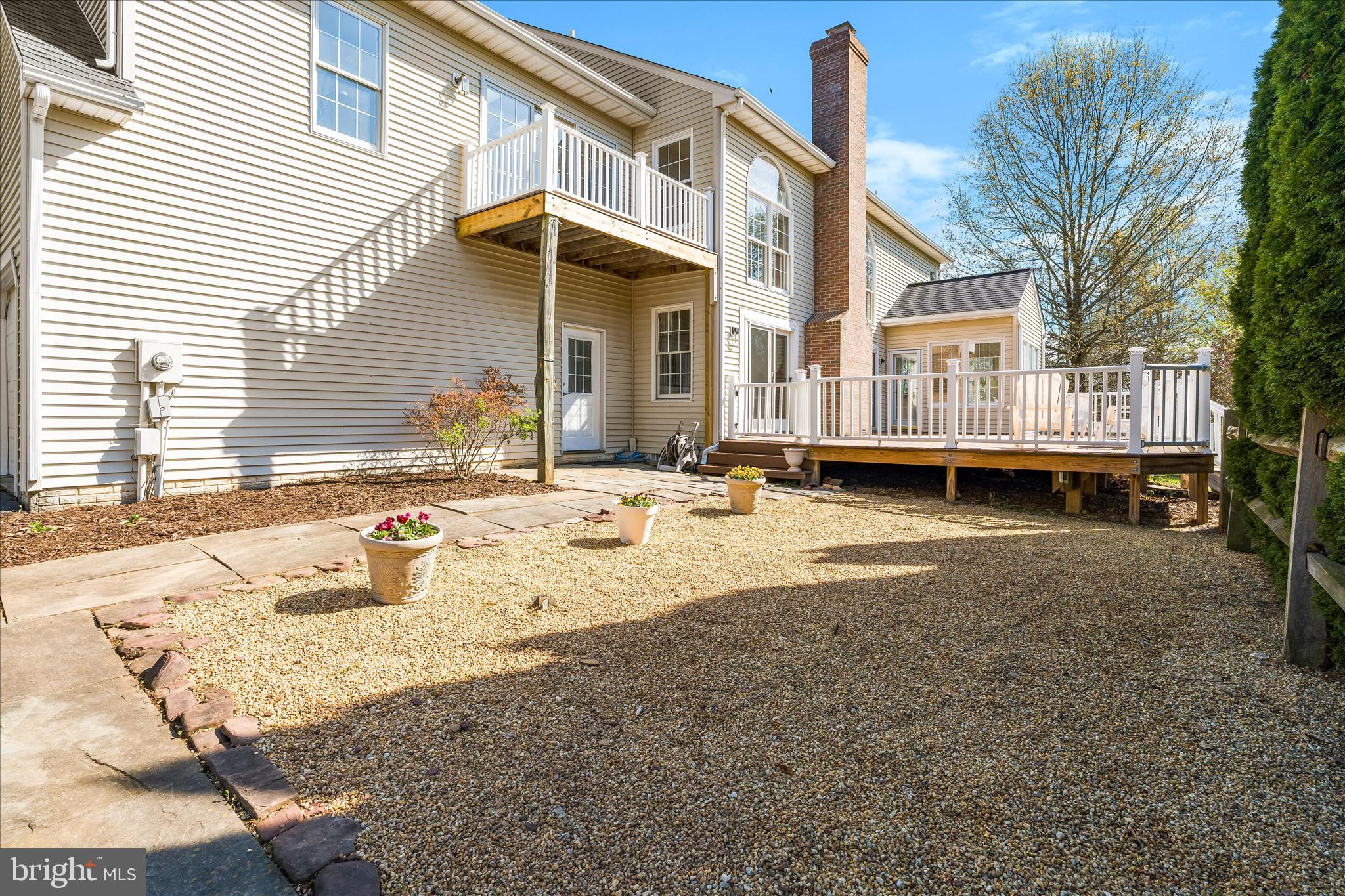 3033 Averley Road Ijamsville, MD 21754 - Photo 15 of 115 a view of a house with a yard and sitting area