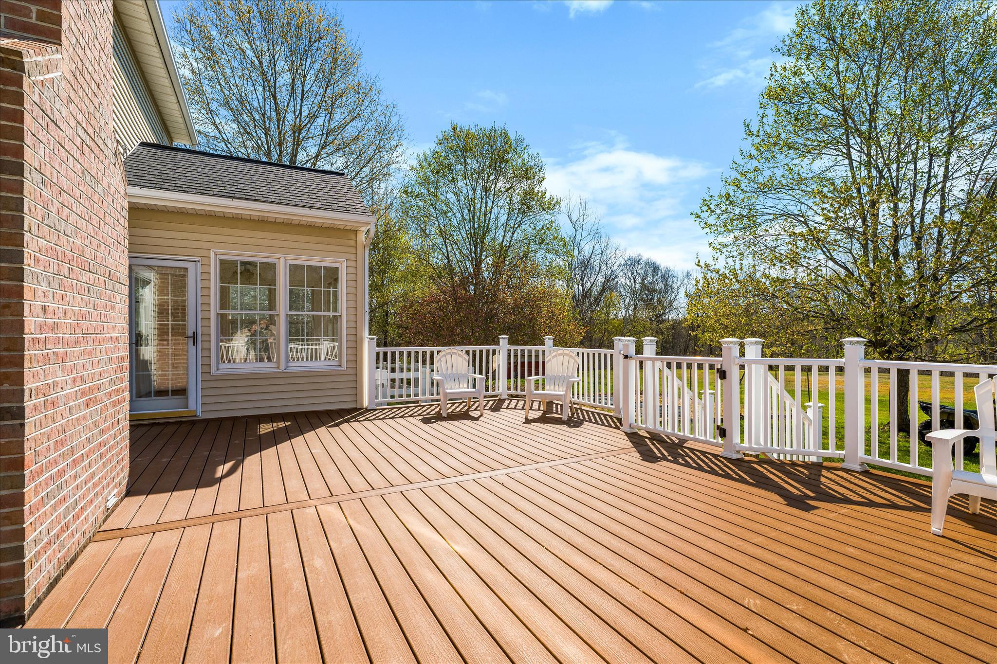 3033 Averley Road Ijamsville, MD 21754 - Photo 17 of 115 a balcony with wooden floor and fence
