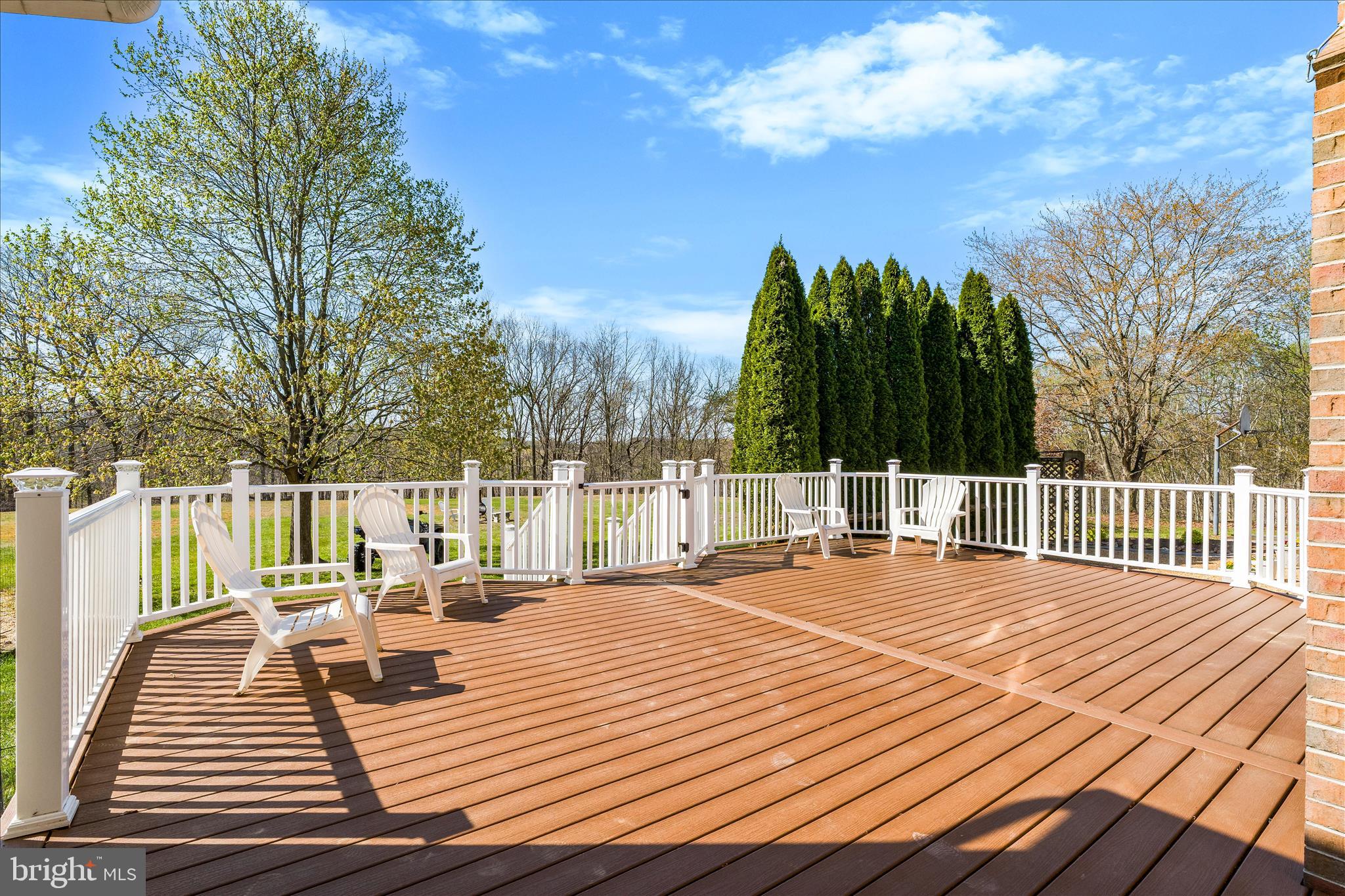 3033 Averley Road Ijamsville, MD 21754 - Photo 19 of 115 a patio on a deck with a patio