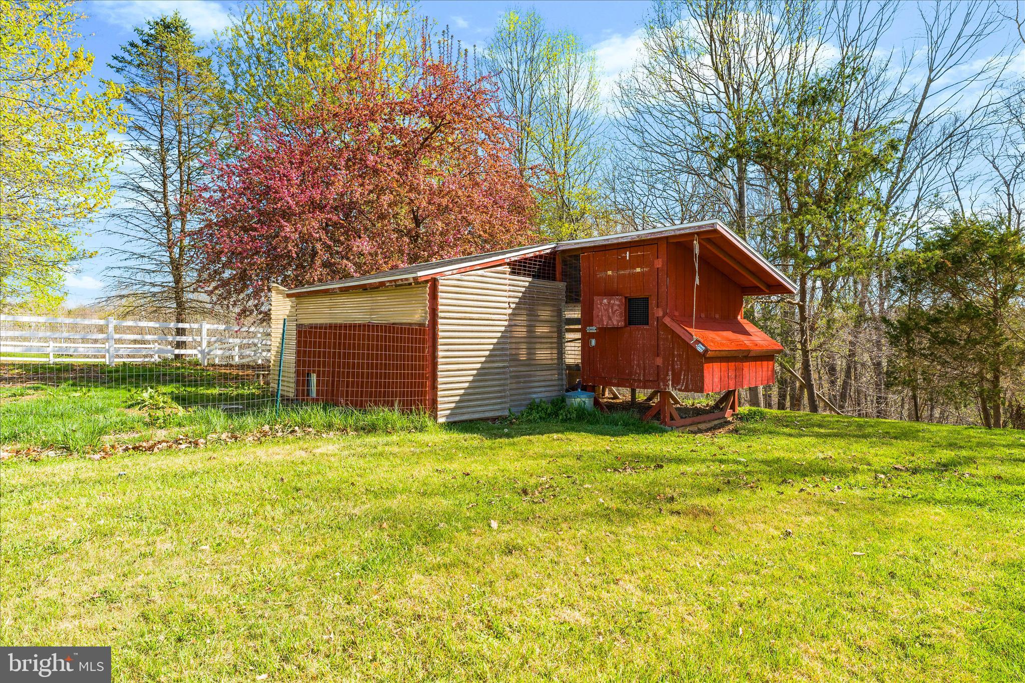 3033 Averley Road Ijamsville, MD 21754 - Photo 27 of 115 a view of a back yard of the house with green space
