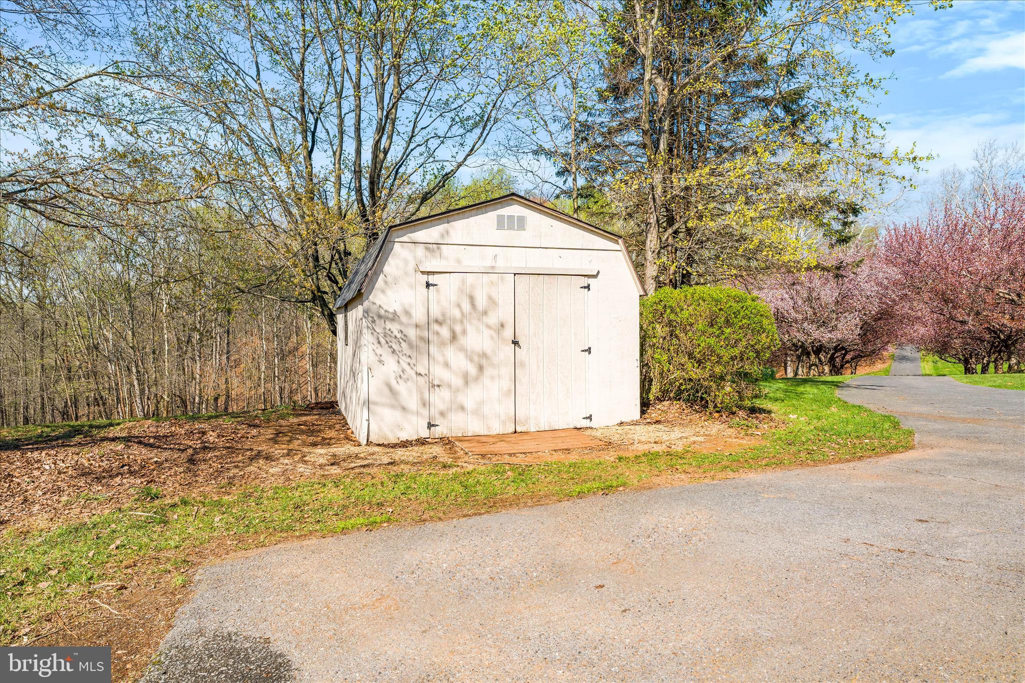 3033 Averley Road Ijamsville, MD 21754 - Photo 34 of 115 a front view of a house with a yard and garage