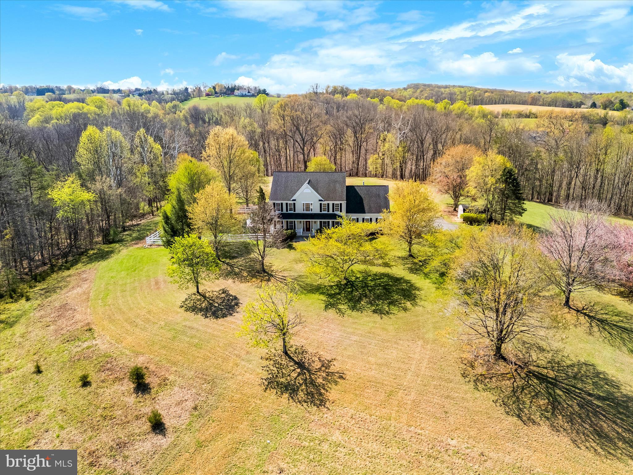 3033 Averley Road Ijamsville, MD 21754 - Photo 35 of 115 a view of a lake with a mountain in the background