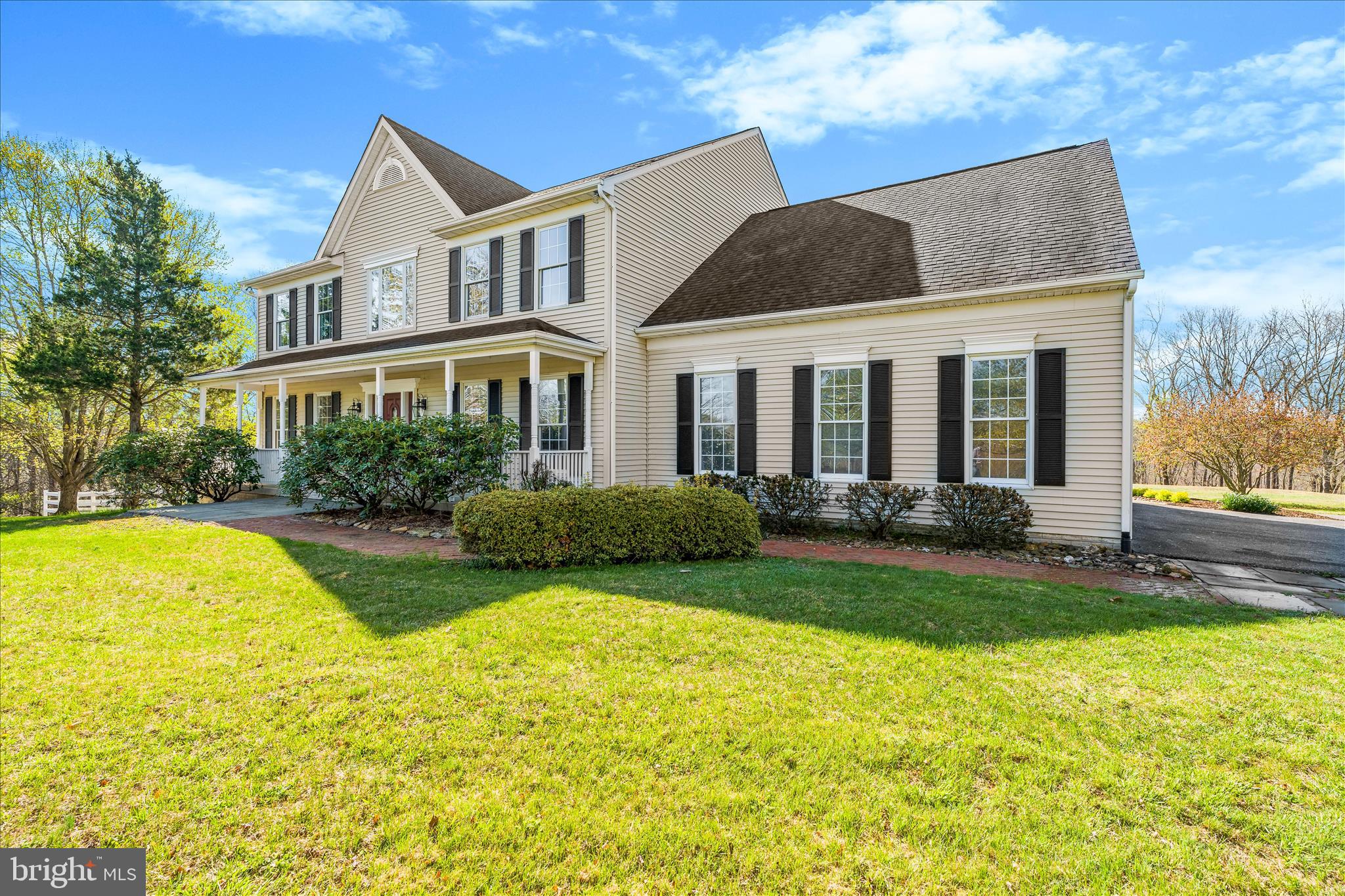 3033 Averley Road Ijamsville, MD 21754 - Photo 4 of 115 a view of a house with swimming pool and yard