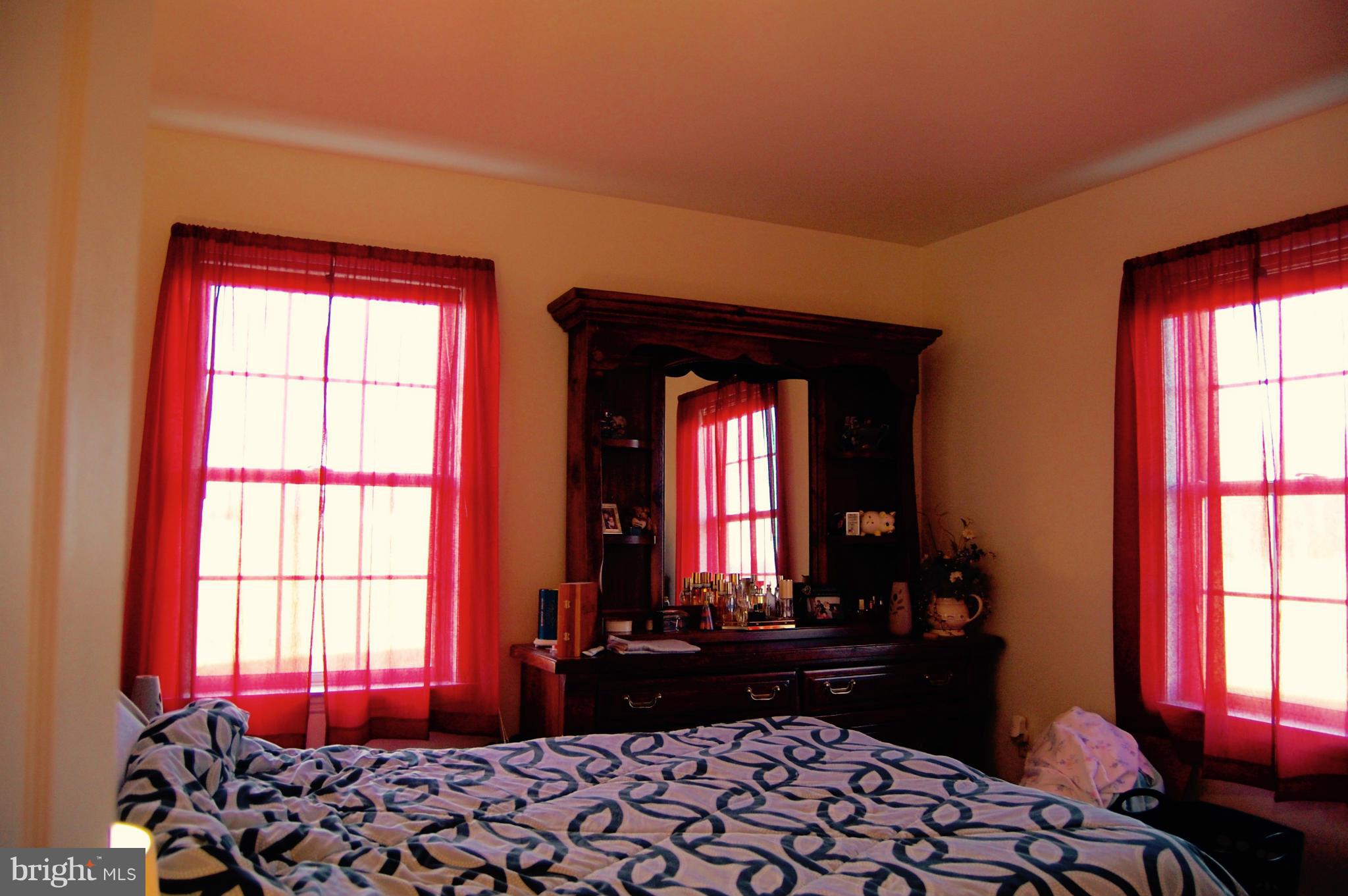 11747 Cash Smith Road Keymar, MD 21757 - Photo 11 of 14 a bedroom with a bed and two window