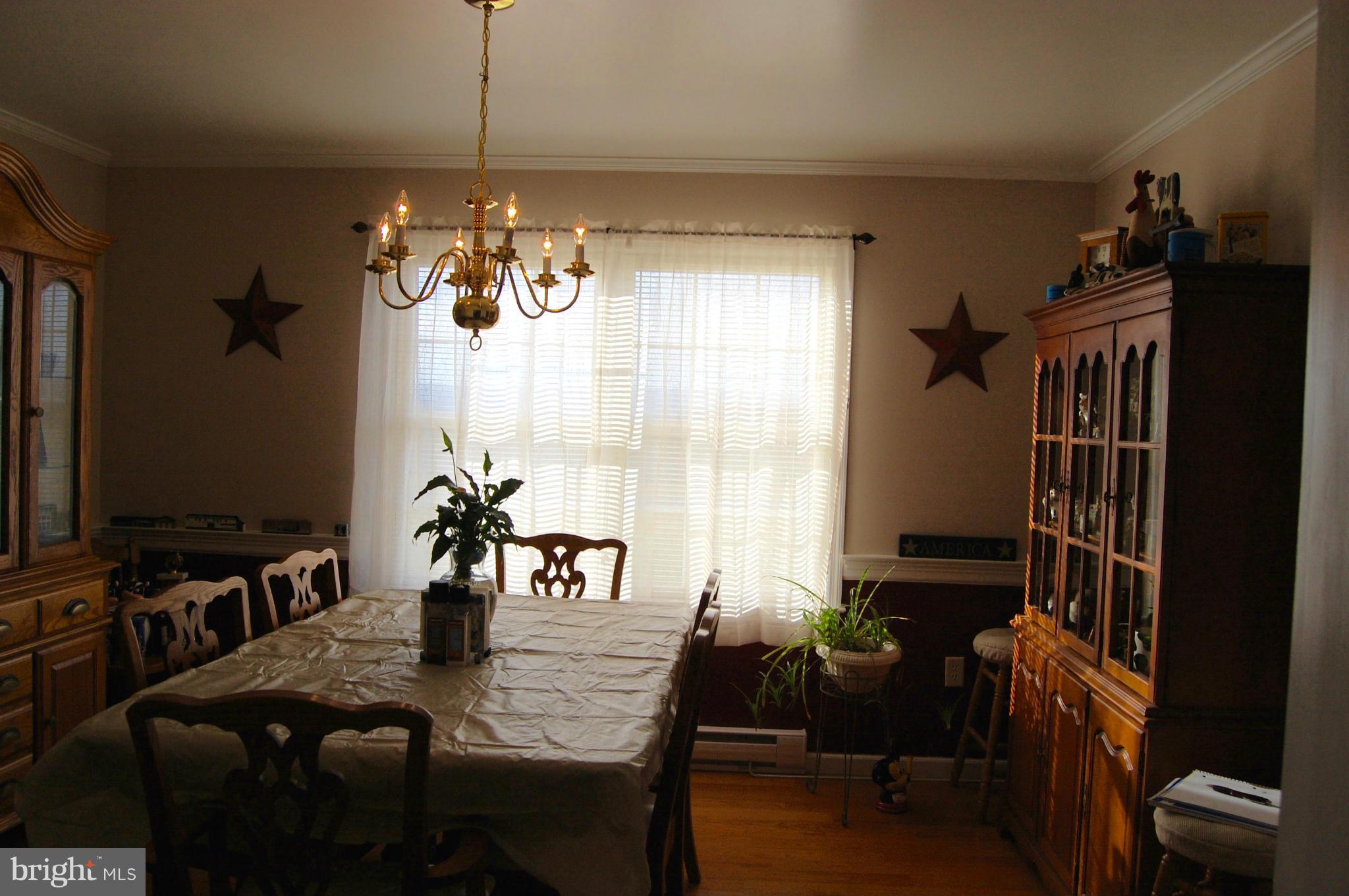11747 Cash Smith Road Keymar, MD 21757 - Photo 3 of 14 a view of a dining room with furniture window and outside view