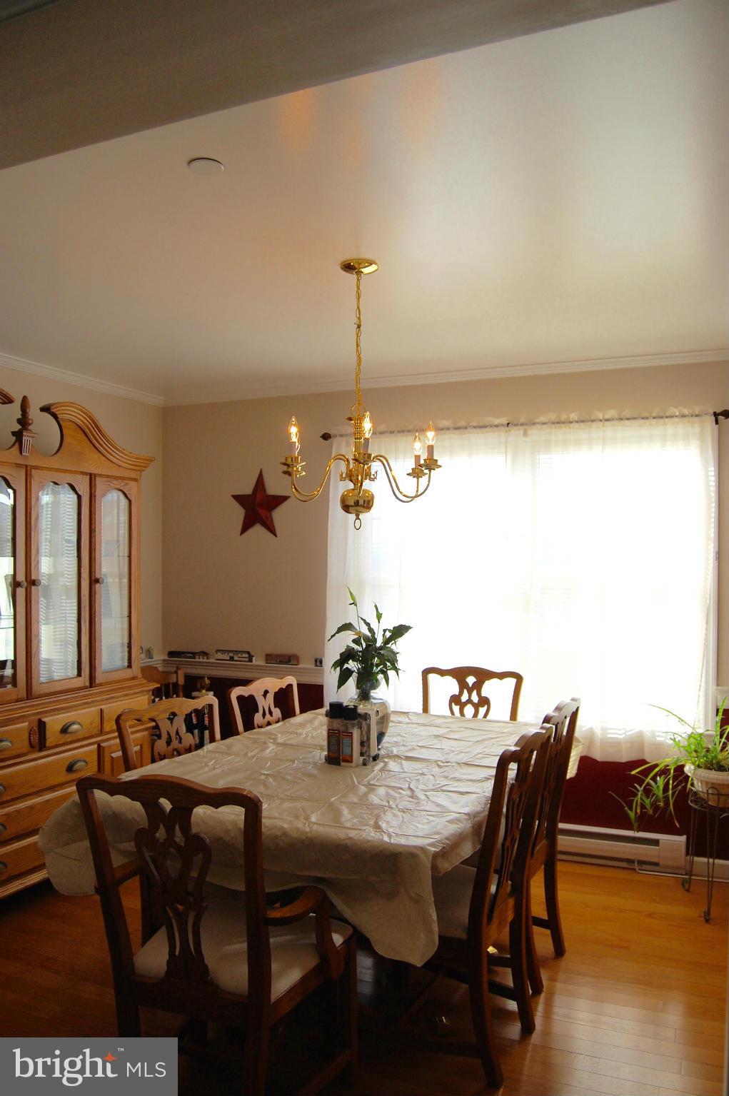 11747 Cash Smith Road Keymar, MD 21757 - Photo 4 of 14 a view of a dining room with furniture and window