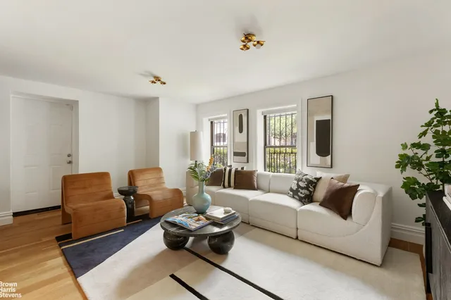 a bathroom with a sink a toilet and bathtub