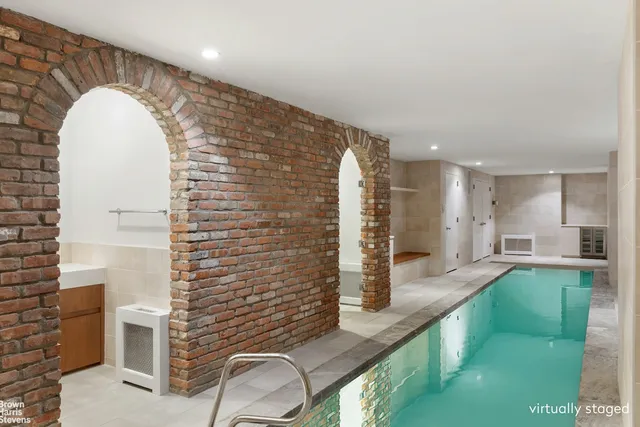 a black and white photo of a living room