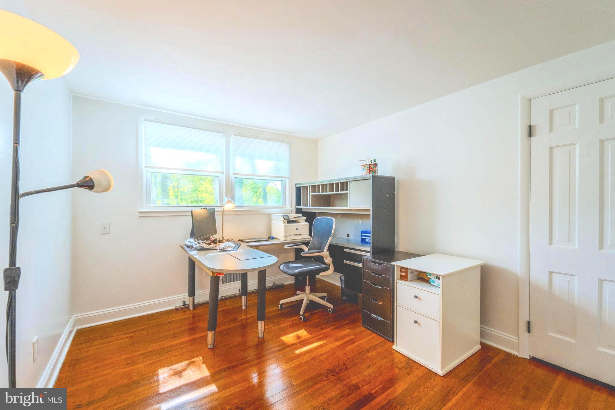 6705 Bracken Court Springfield, VA 22152 - Photo 24 of 40 a work room with furniture a rug and a window