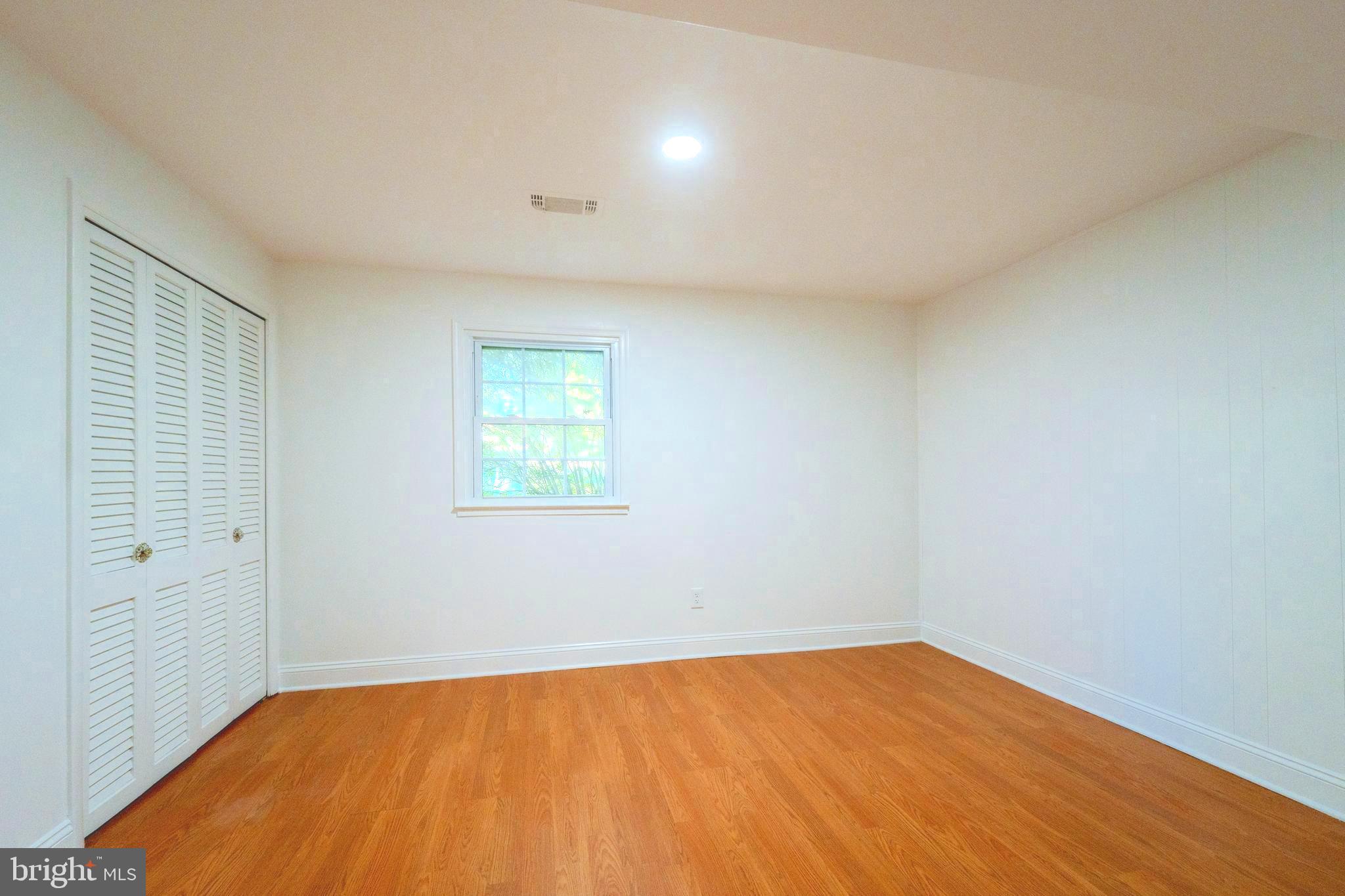 6705 Bracken Court Springfield, VA 22152 - Photo 31 of 40 an empty room with a window