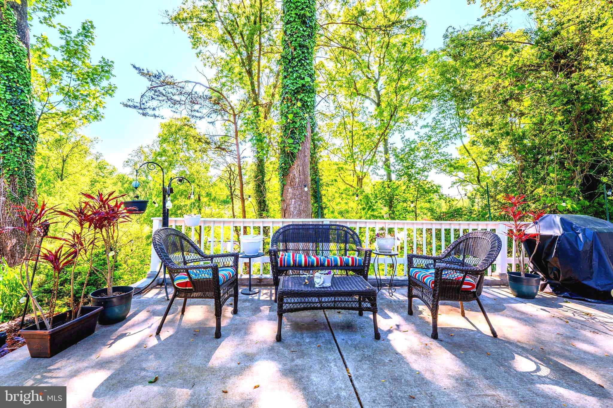 6705 Bracken Court Springfield, VA 22152 - Photo 37 of 40 a view of chairs and tables in the patio