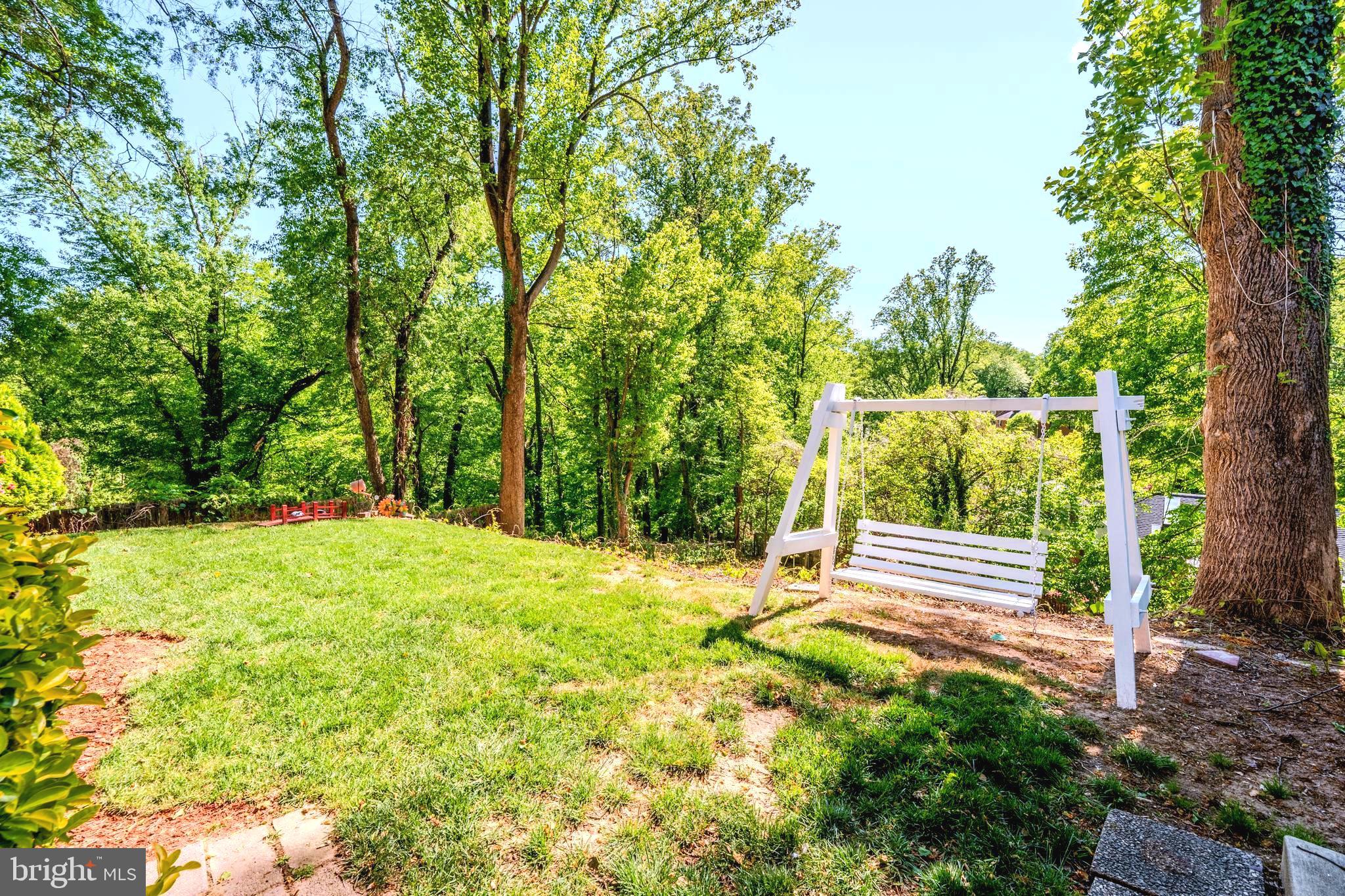 6705 Bracken Court Springfield, VA 22152 - Photo 38 of 40 a view of outdoor space with deck and tree