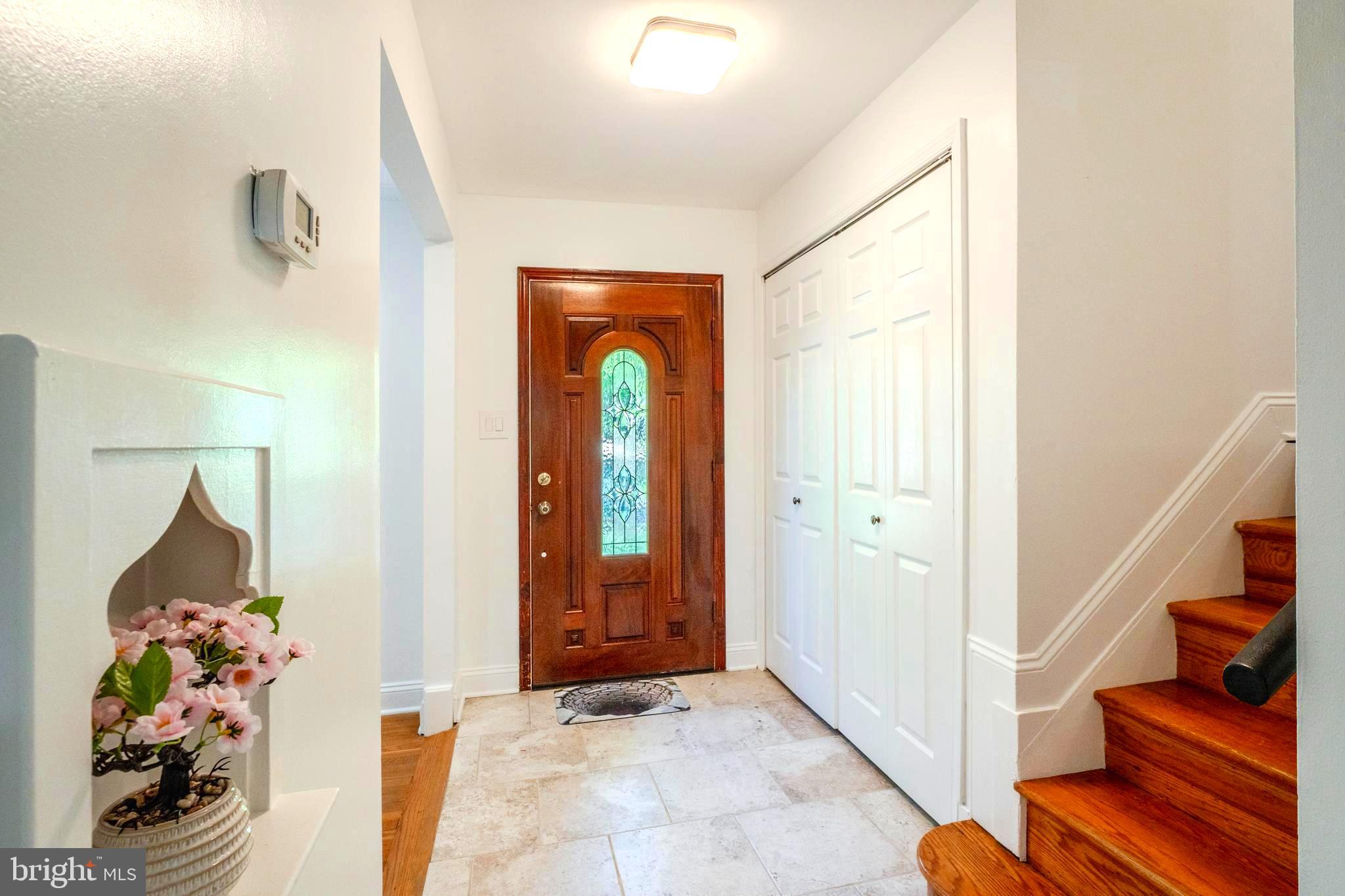 6705 Bracken Court Springfield, VA 22152 - Photo 4 of 40 a view of an entryway with wooden floor