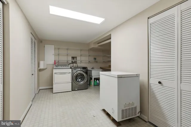 a utility room with dryer and washer