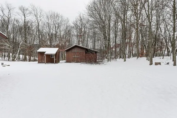 a view of snow on the side of road