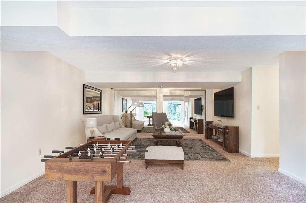 306 Georgetown Lane Export, PA 15632 - Photo 18 of 35 a living room with furniture and a flat screen tv