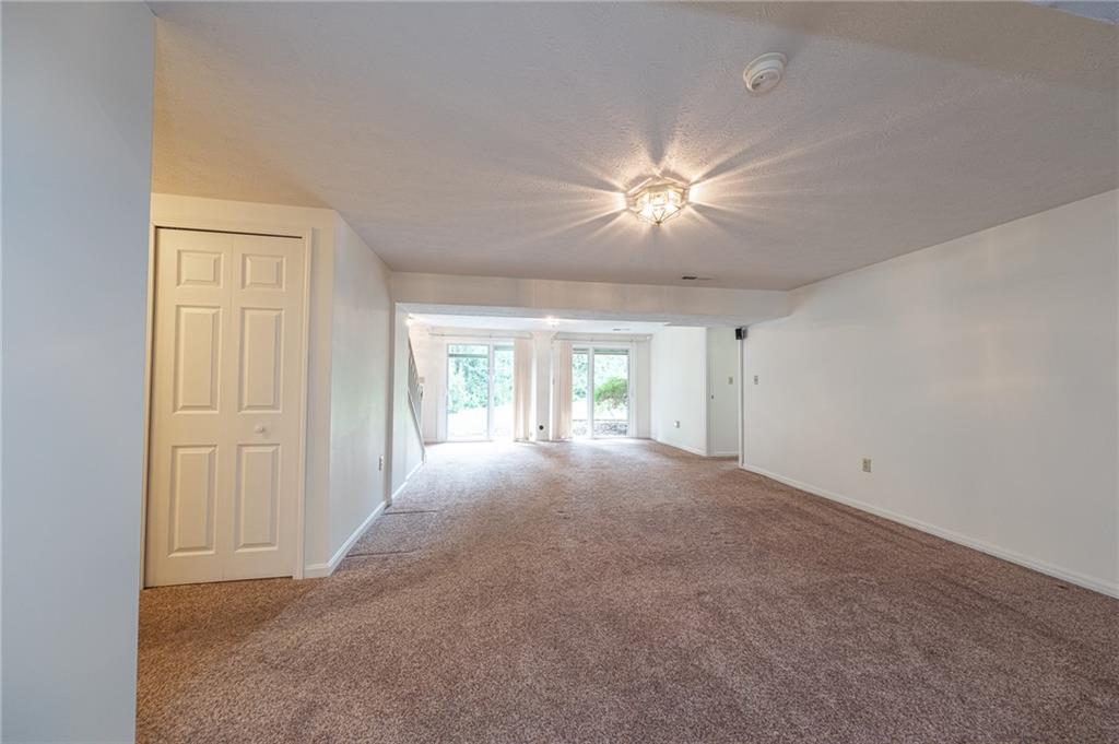306 Georgetown Lane Export, PA 15632 - Photo 21 of 35 a view of empty room with a ceiling fan