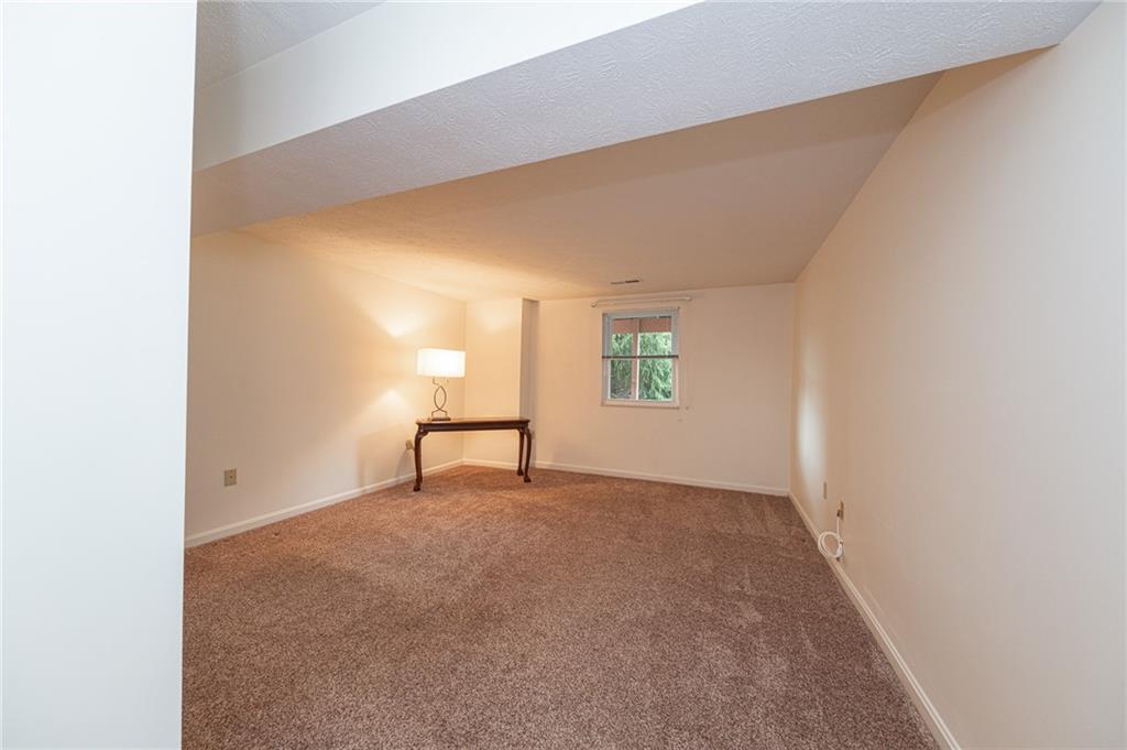 306 Georgetown Lane Export, PA 15632 - Photo 23 of 35 a view of an empty room with a window