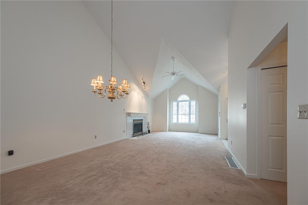 306 Georgetown Lane Export, PA 15632 - Photo 8 of 35 a view of a chandelier and window in a room