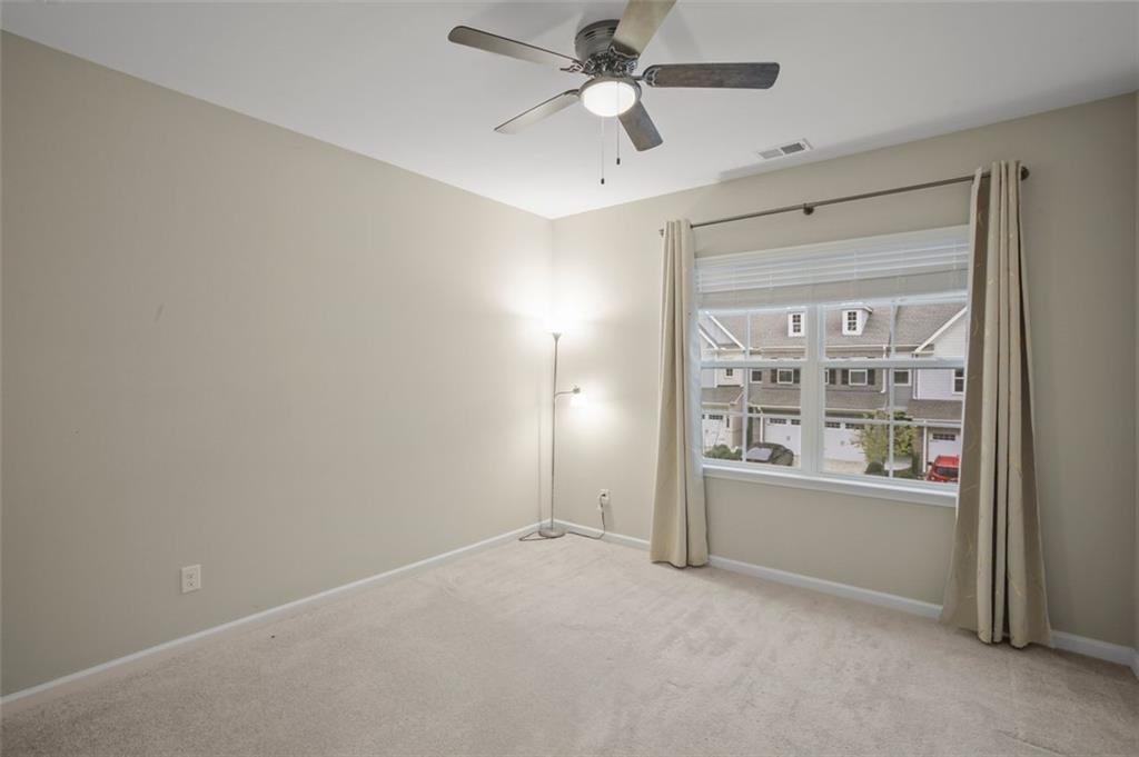 465 Duval Drive Alpharetta, GA 30009 - Photo 11 of 21 an empty room with windows and closet