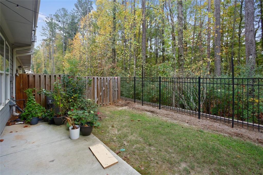 465 Duval Drive Alpharetta, GA 30009 - Photo 15 of 21 a view of a chair and table in the garden