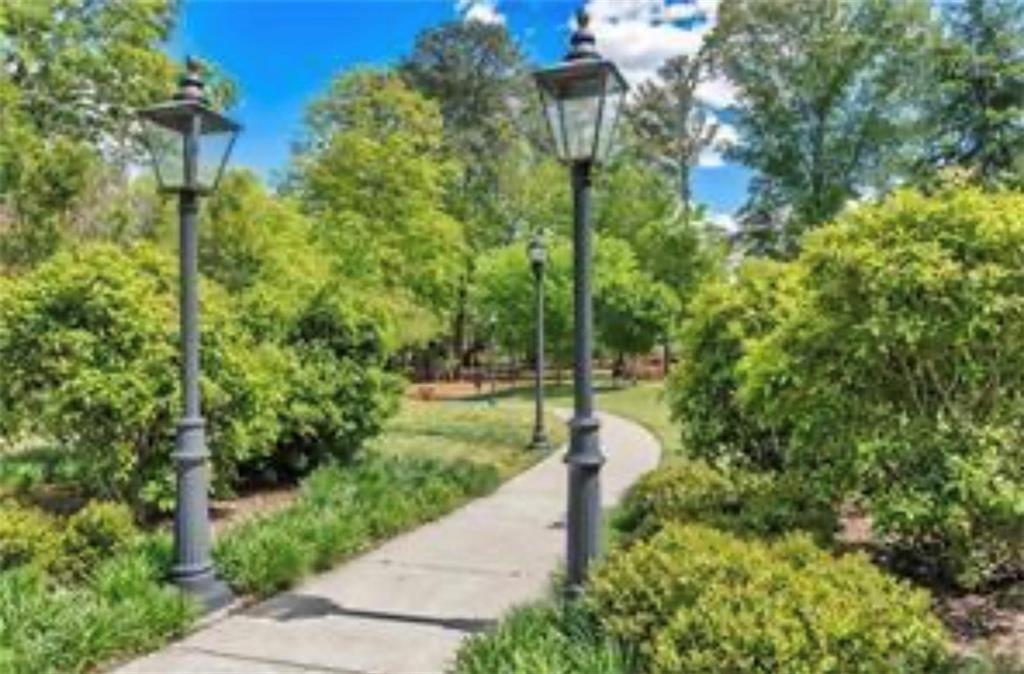 465 Duval Drive Alpharetta, GA 30009 - Photo 19 of 21 a backyard of a house with a yard and outdoor seating