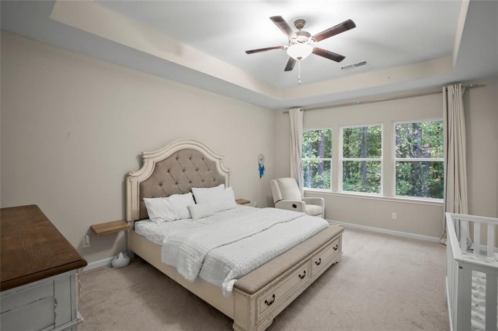 465 Duval Drive Alpharetta, GA 30009 - Photo 7 of 21 a bedroom with a bed and a window