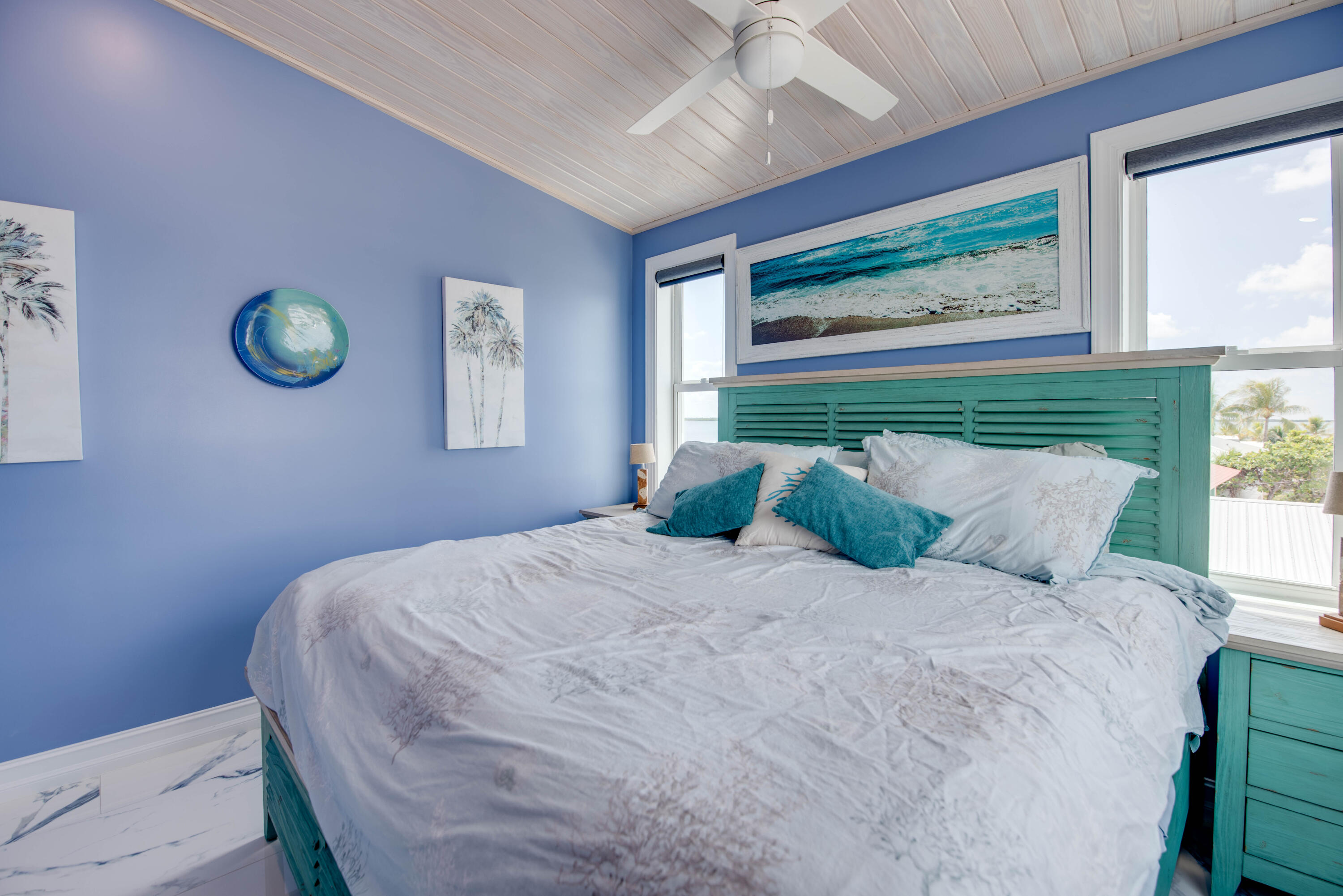 747 La Fitte Road Summerland Key, FL 33042 - Photo 98 of 103 a large bed sitting in a bedroom next to a window
