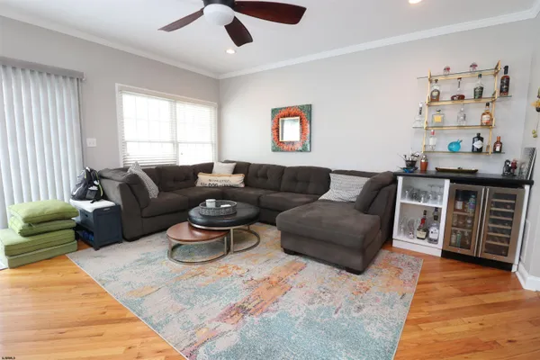a living room with furniture or couch and a window