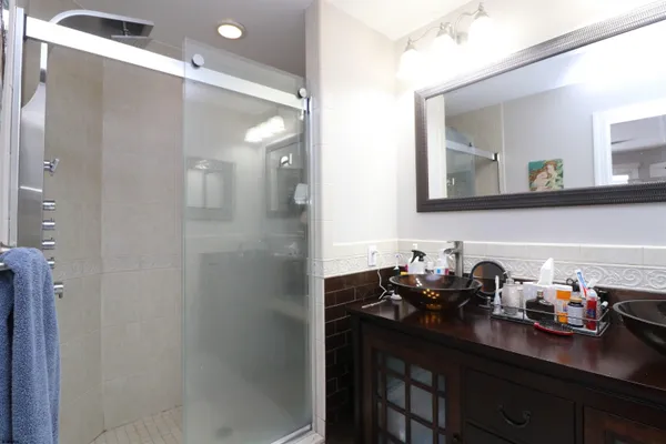 a kitchen with a sink cabinets and appliances