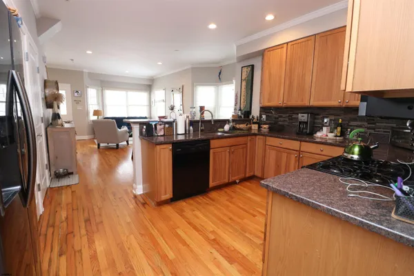 a kitchen with lots of counter top space and appliances