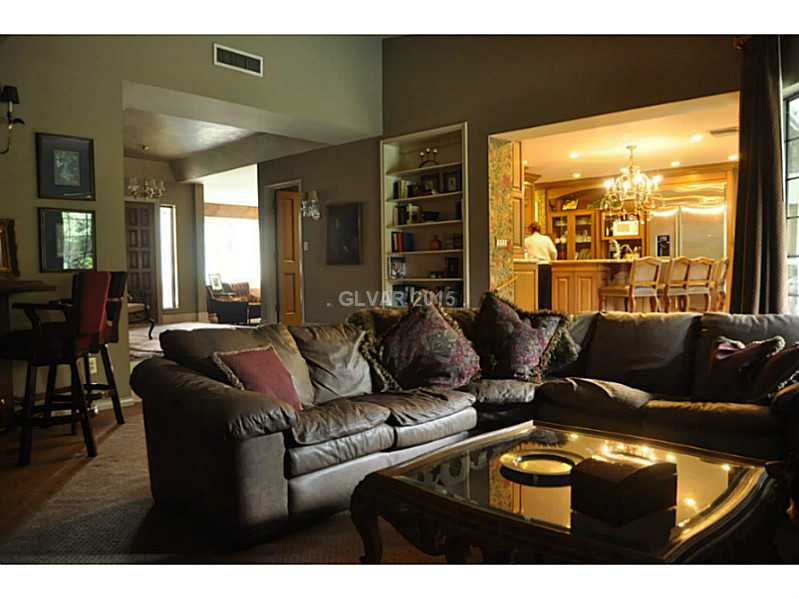 1485 Westwind Road Las Vegas, NV 89146 - Photo 13 of 13 Family Room. also features a fireplace and wet bar