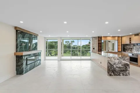 a open kitchen with large windows