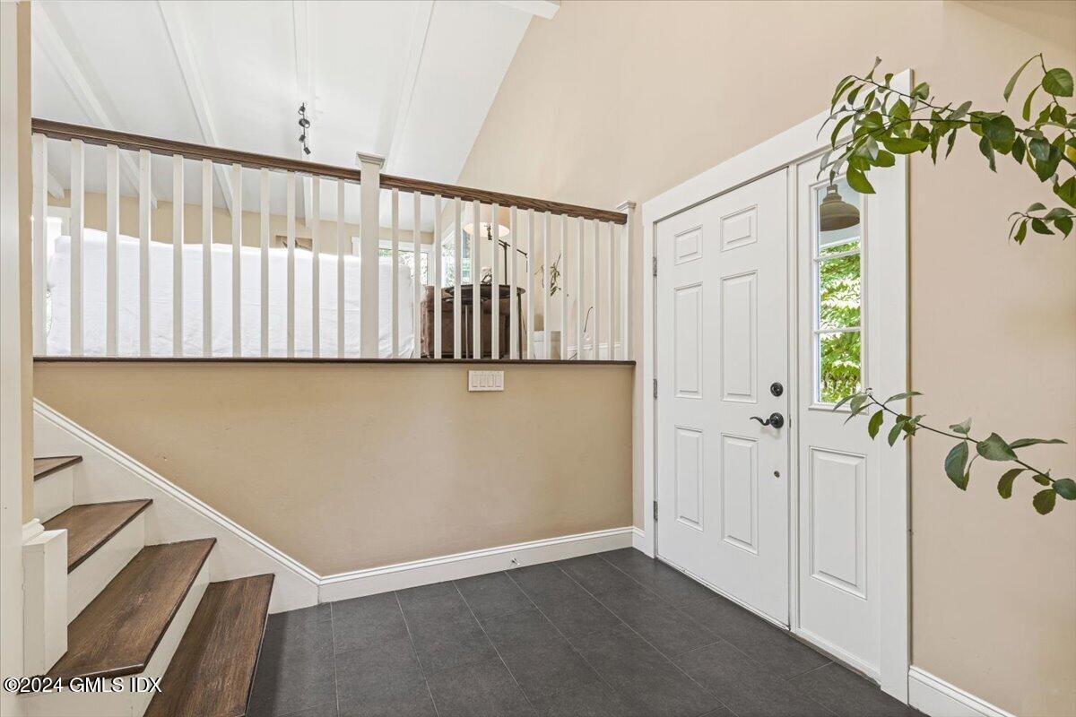 70 Gregory Road Cos Cob, CT 06807 - Photo 3 of 39 a view of a hallway with entryway