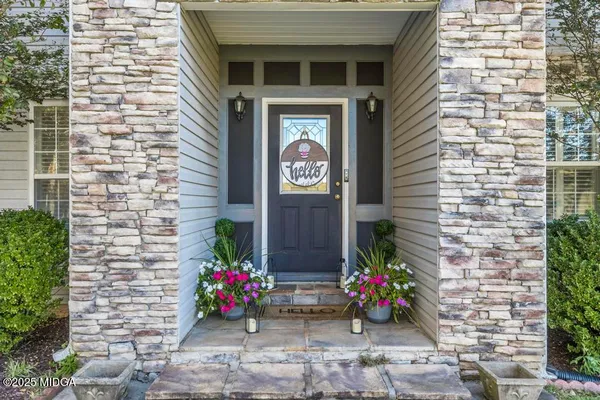 a front view of a house with an outdoor space