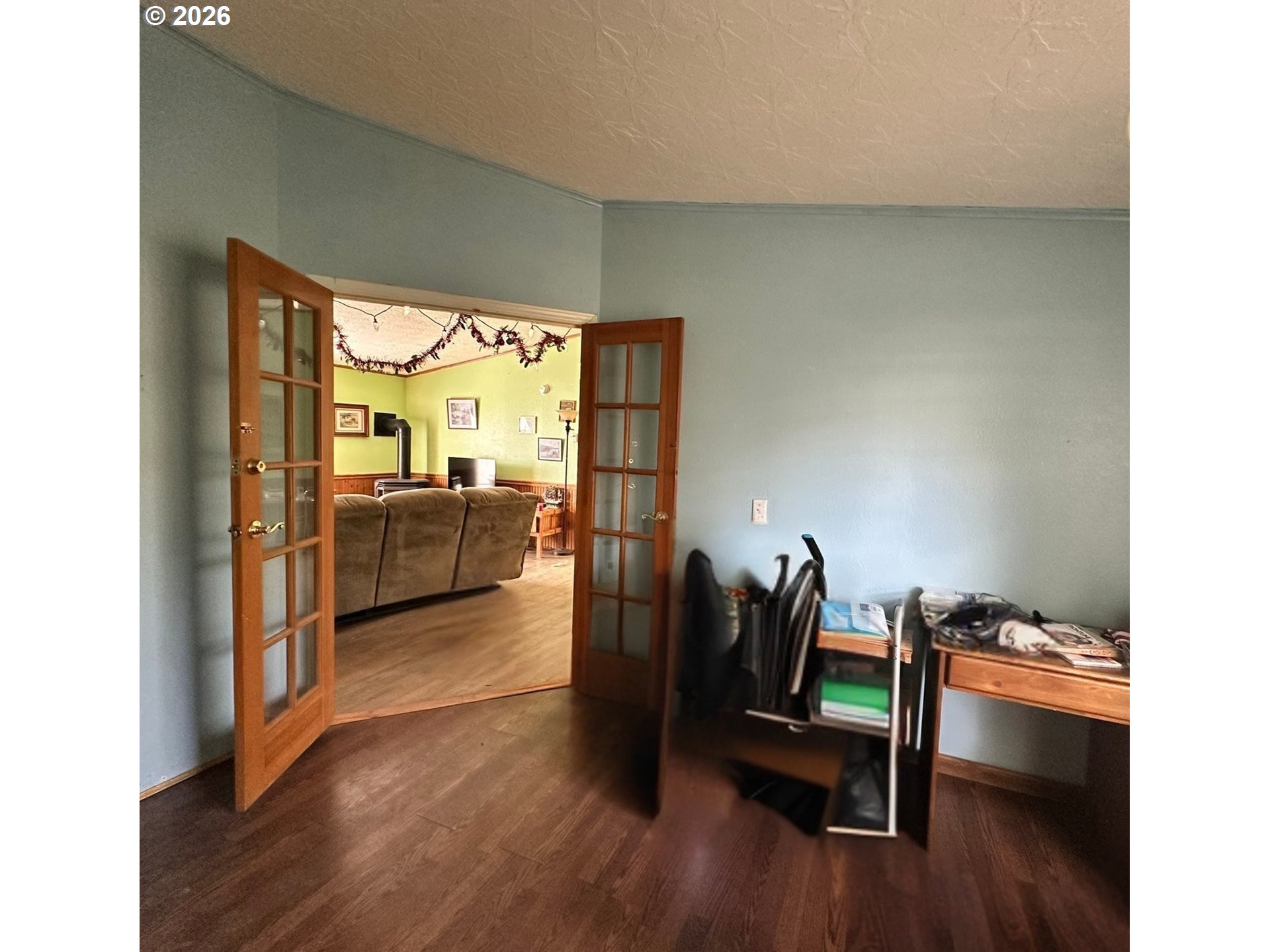 4821 Northeast 50th Street Neotsu, OR 97364 - Photo 12 of 19 a view of a room with furniture and wooden floor