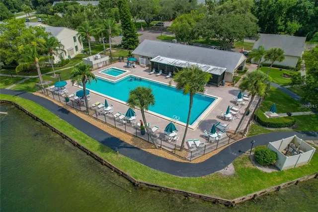 an aerial view of a house with a garden and outdoor space