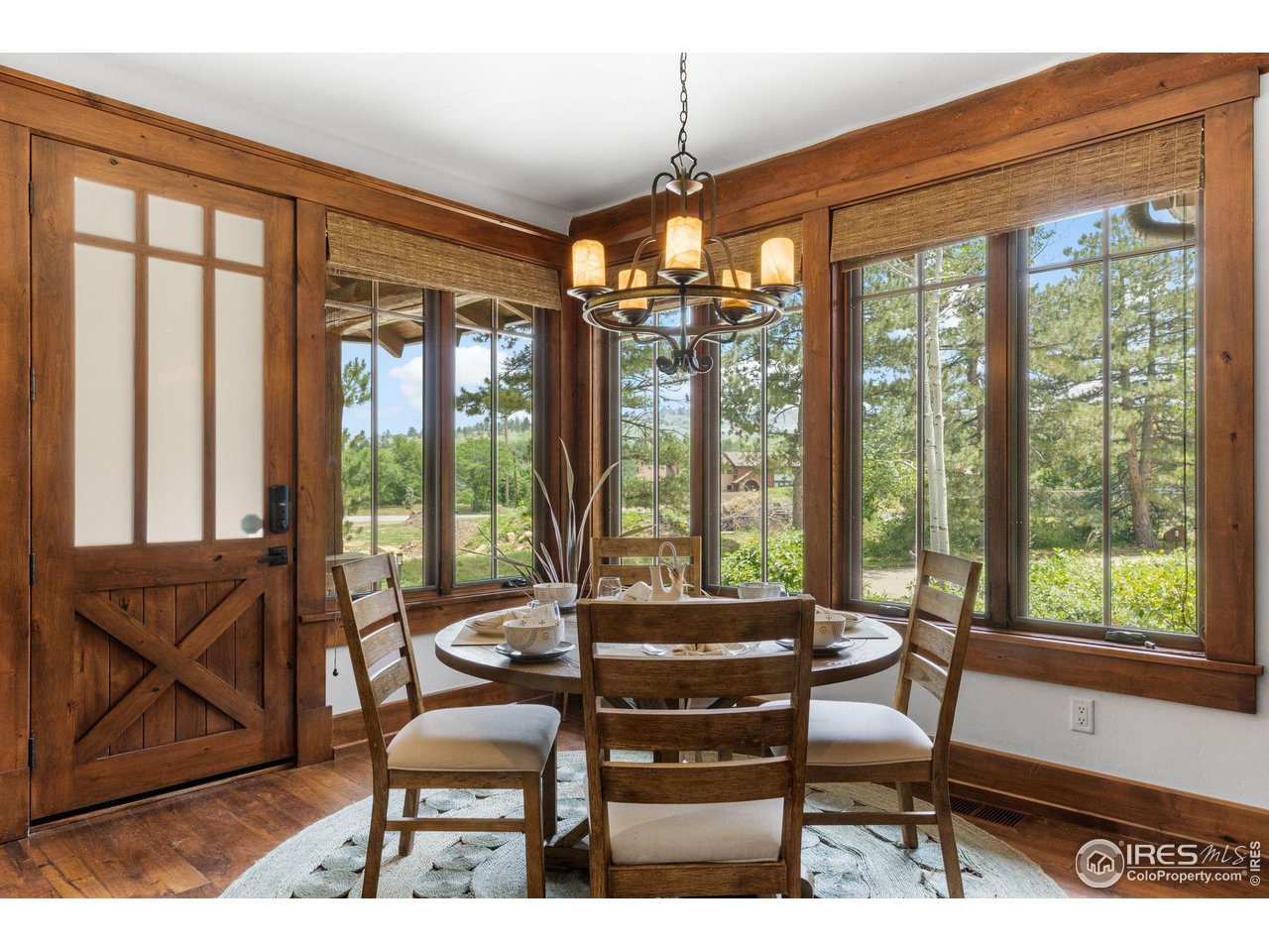 4651 Eldorado Springs Drive Boulder, CO 80303 - Photo 22 of 40 a living room with furniture and a floor to ceiling window