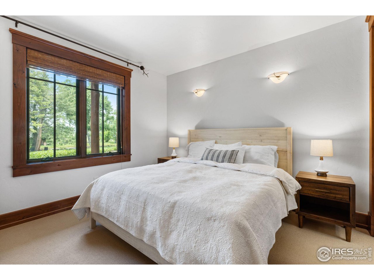 4651 Eldorado Springs Drive Boulder, CO 80303 - Photo 31 of 40 a bedroom with a bed and a window