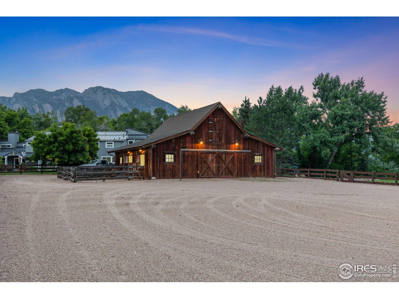 4651 Eldorado Springs Drive Boulder, CO 80303 - Photo 5 of 40 a front view of a house with a yard