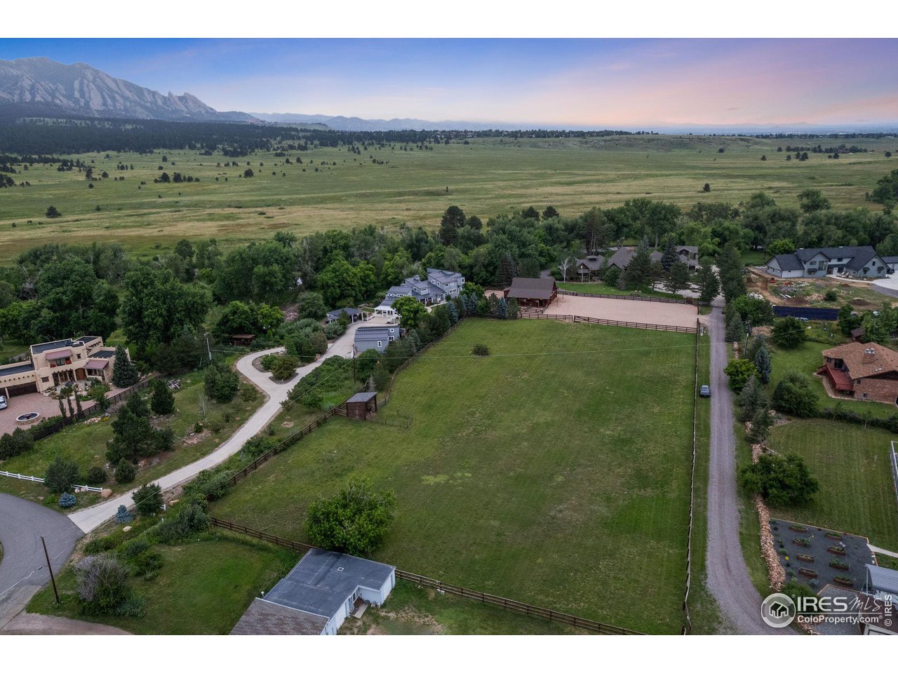 4651 Eldorado Springs Drive Boulder, CO 80303 - Photo 7 of 40 a view of a city with a lush green forest