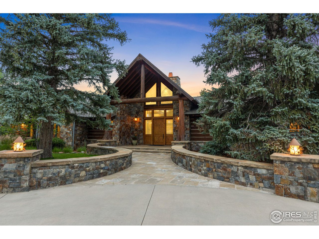 4651 Eldorado Springs Drive Boulder, CO 80303 - Photo 8 of 40 a front view of a house with garden