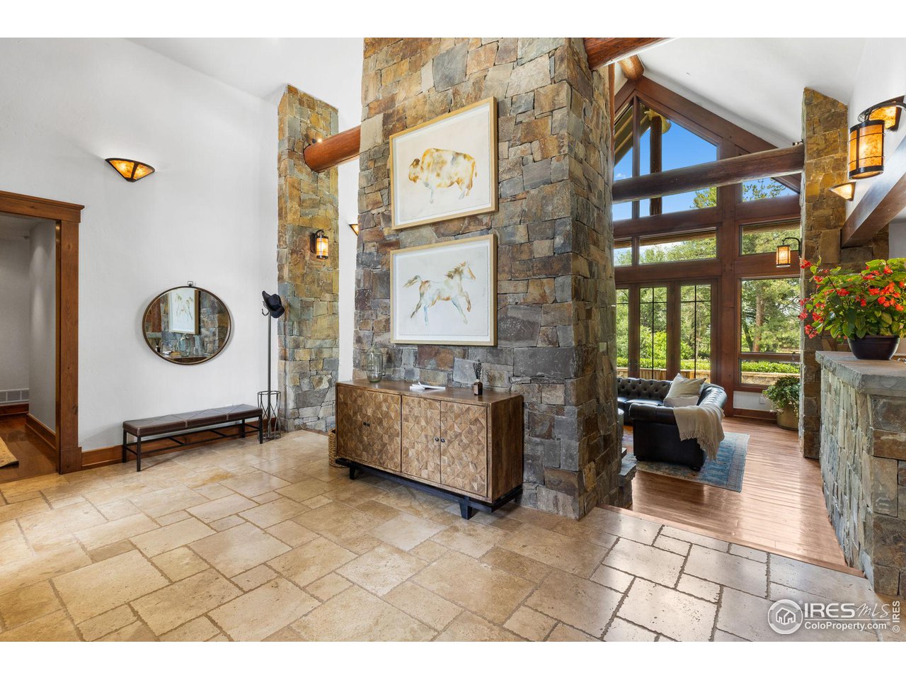 4651 Eldorado Springs Drive Boulder, CO 80303 - Photo 9 of 40 a view of a entryway door with furniture