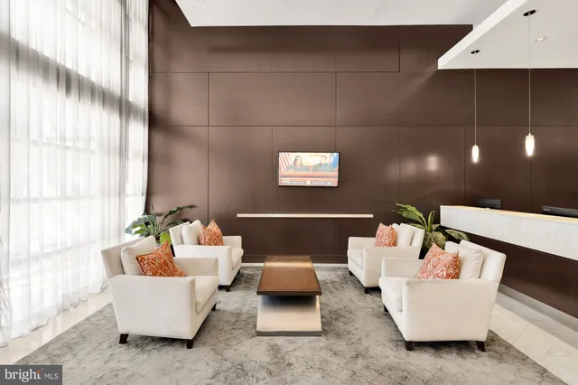 a living room with furniture and a couch