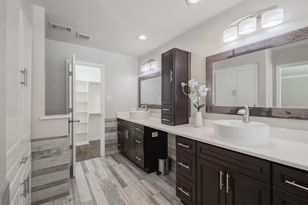 3316 Appalachian Way Plano, TX 75075 - Photo 16 of 29 a spacious bathroom with a double vanity sink shower and a mirror