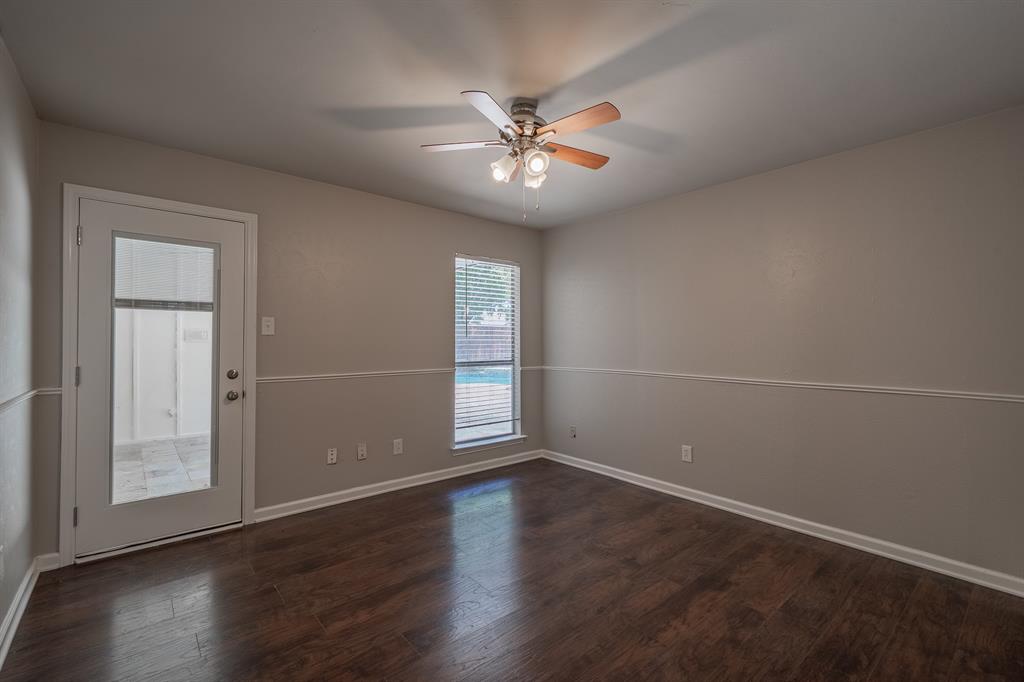 3316 Appalachian Way Plano, TX 75075 - Photo 20 of 29 an empty room with wooden floor fan and windows