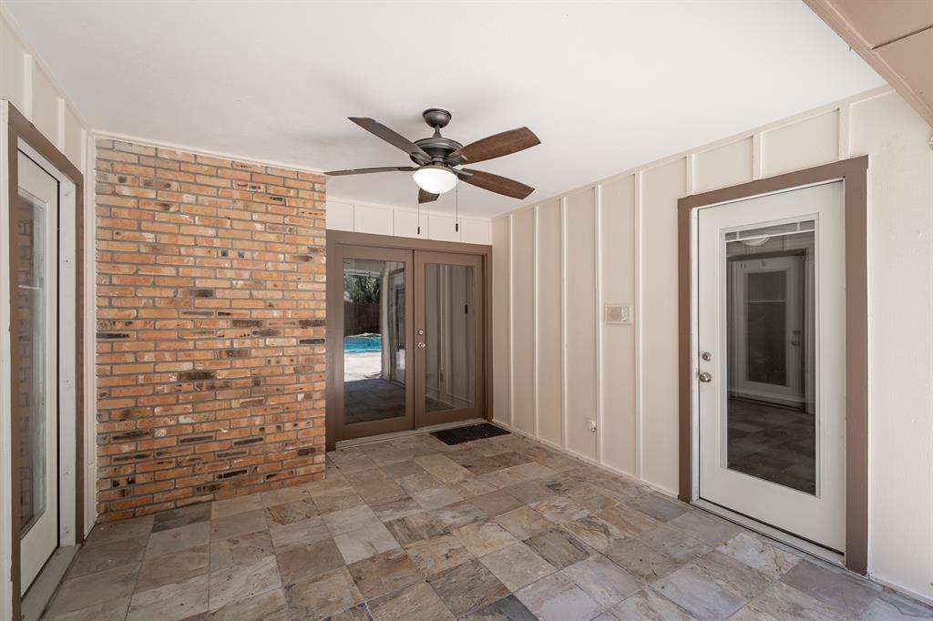 3316 Appalachian Way Plano, TX 75075 - Photo 23 of 29 a view of a hallway with a chandelier fan