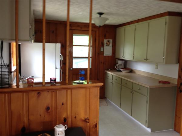 10 Cove Road Ipswich, MA 01938 - Photo 3 of 9 a kitchen with a sink and cabinets
