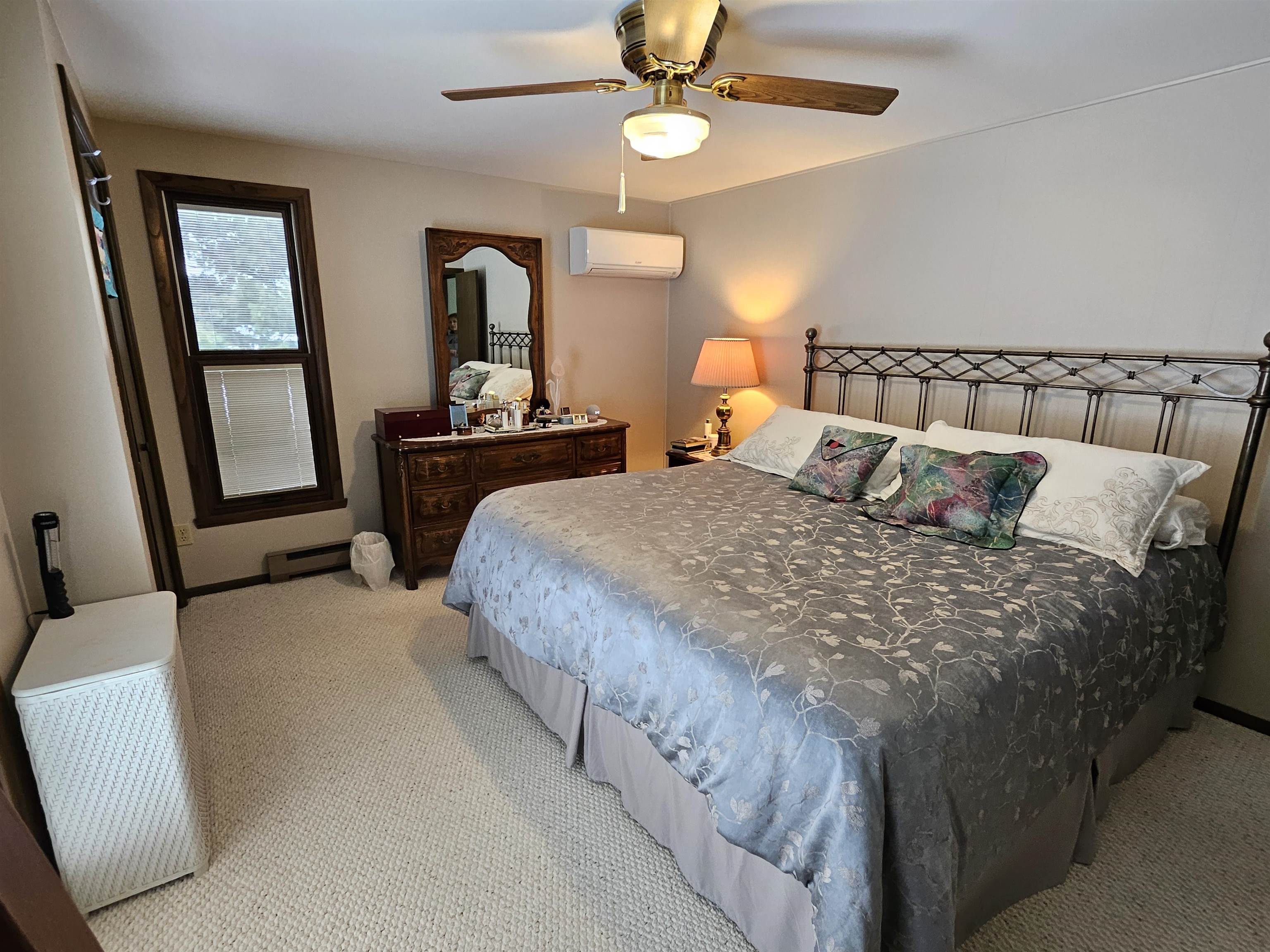 2155 Oriole Drive Freeport, IL 61032 - Photo 6 of 20 a bedroom with a large bed and a chandelier