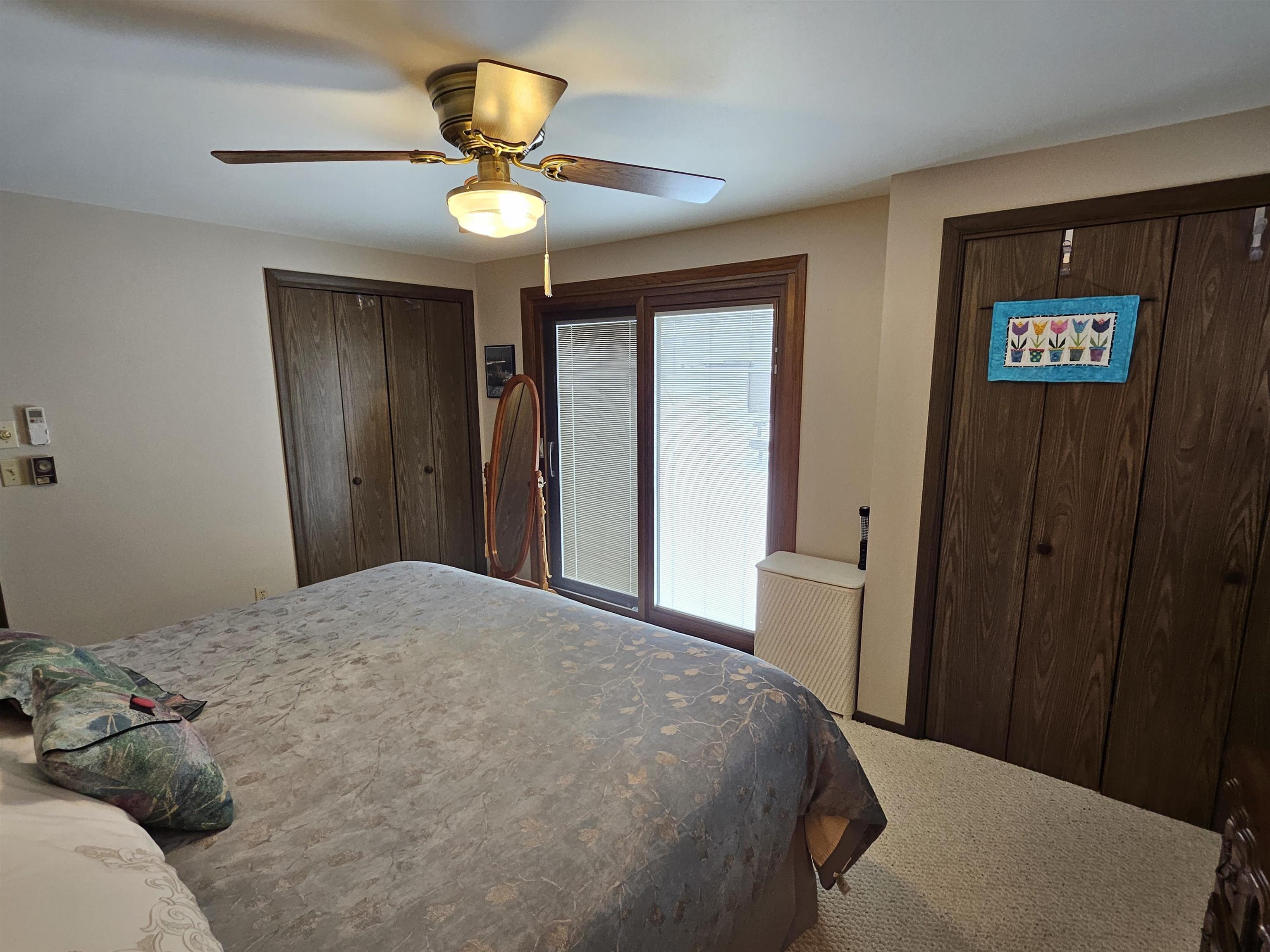 2155 Oriole Drive Freeport, IL 61032 - Photo 7 of 20 a bedroom with a bed and a chandelier